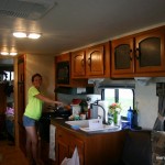 Marie at the stove in the camper